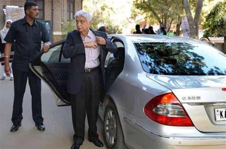 Azim Premji captured while getting out of his car.