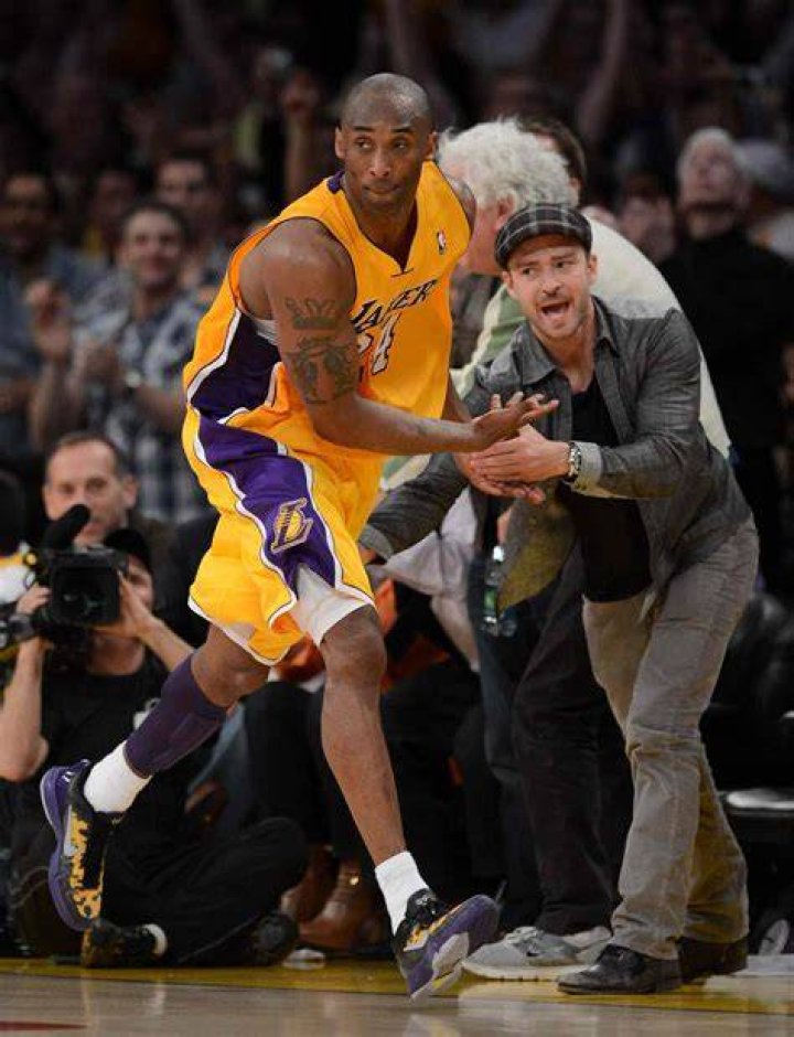 Kobe Bryant slapping Justin Timberlake's hand